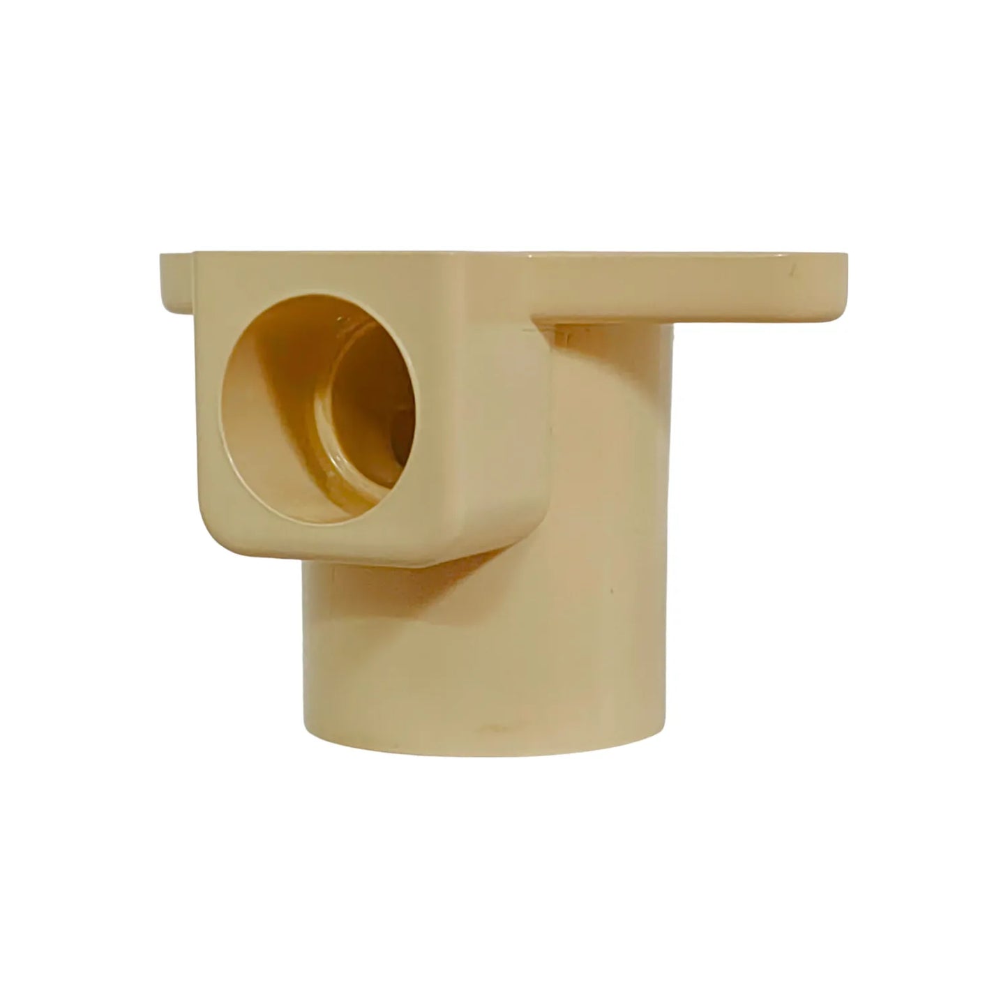 Cuerpo de drenaje de piso PVC color crema, con conexión lateral abierta para sistemas de plomería.