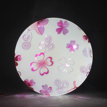 Lámpara redonda de sobreponer para techo con diseño de tréboles rosas brillantes y espirales.