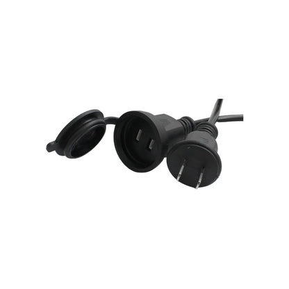 Extensión eléctrica negra de 2 polos con tapa protectora de seguridad para uso en exteriores.